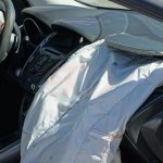 The result of an accident with the driver and front passenger unfastened